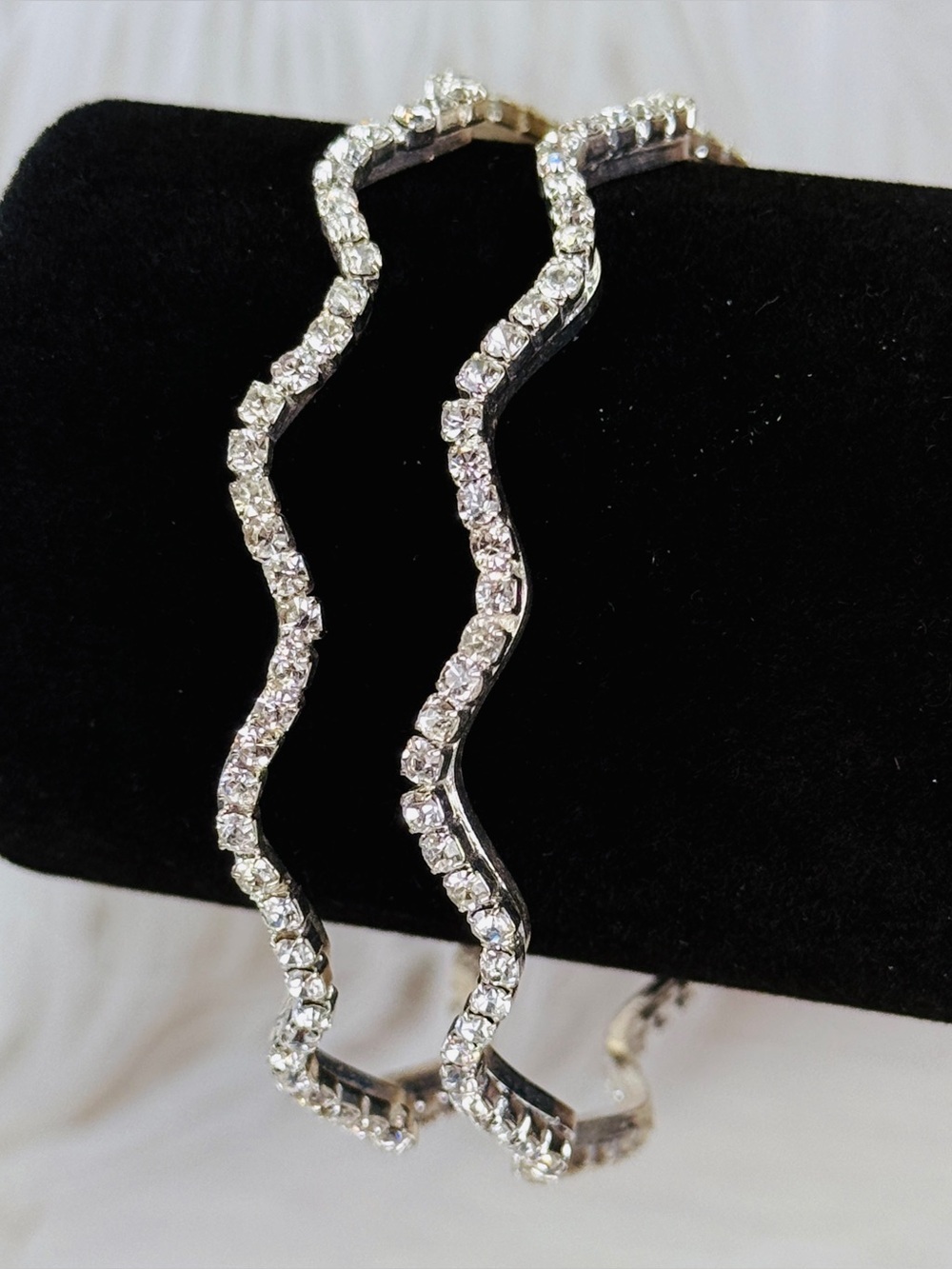 Elegant set of 2 lightweight Silvertone Wave Zig Zag Crystal Accentd Bracelets
